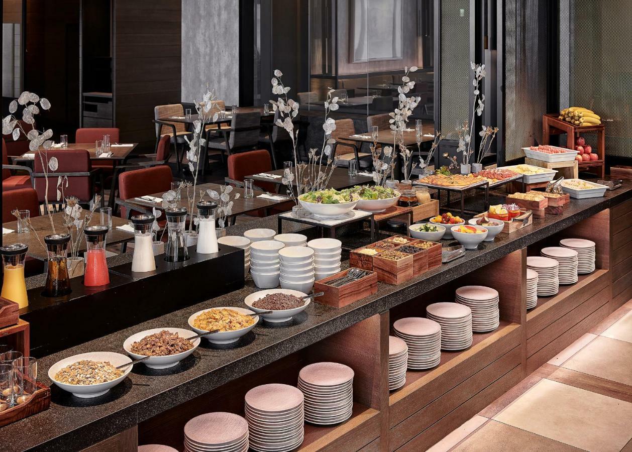 Mu Jiaoxi Hotel Exterior foto A buffet at a hotel